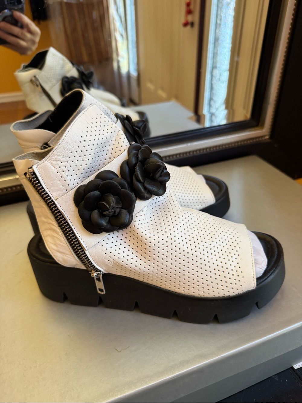 Women’s White Perforated Ankle Bootie with Black Floral Accent